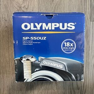 Olympus SP-550UZ Camera in Blue Packaging